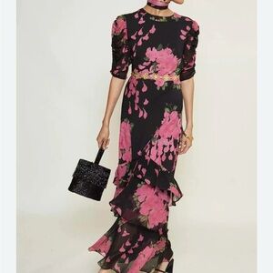 RIXO Evelyn Tiered Midi Dress in Blossom Pink.